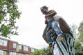 Father giving daughter piggyback ride