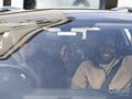 Mother with children sitting in car