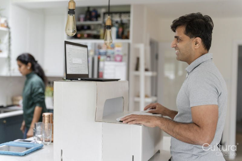 Man working on laptop at home