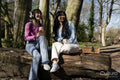 Young female friends relaxing in park