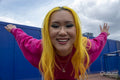 Portrait of smiling young woman with yellow hair