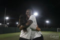 Female soccer players celebrating