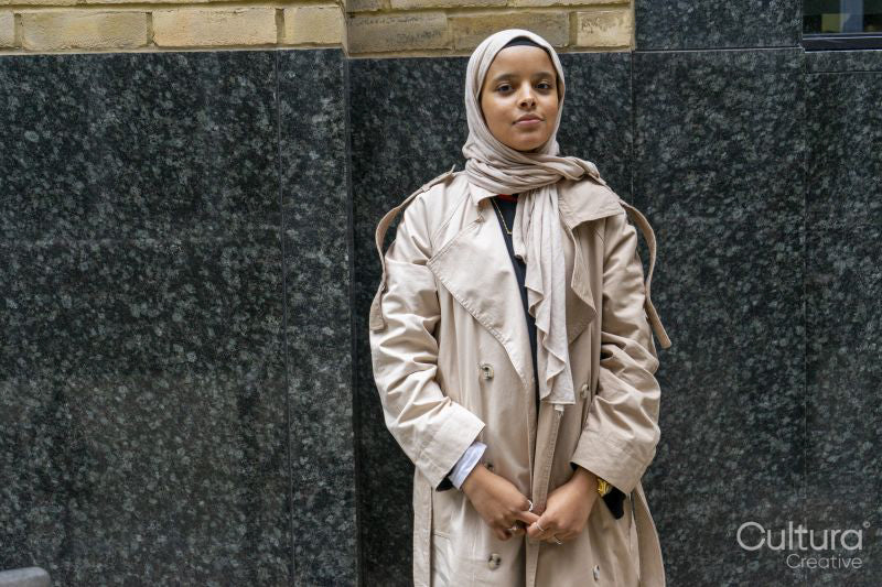 Portrait of young woman wearing hijab
