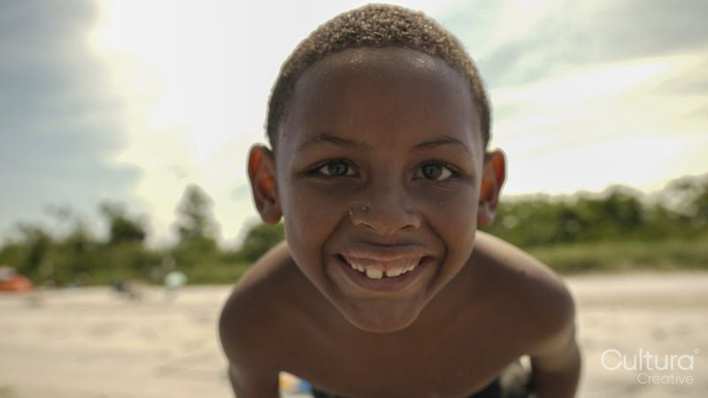 Portrait of smiling boy on beach
