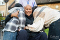Family visiting senior man at nursing home