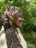 Smiling mature woman on hiking trip