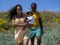 Family with baby son going to beach