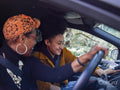 Woman and girl in car