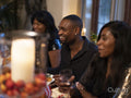 Smiling family having Thanksgiving dinner