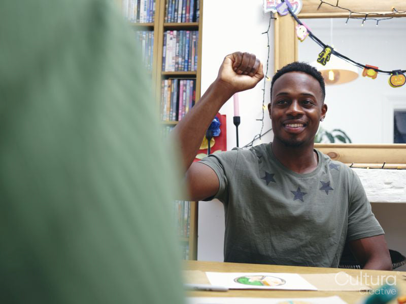 Man making protest sign,punching air