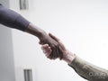 Men holding hands