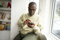 Man with Down syndrome using phone