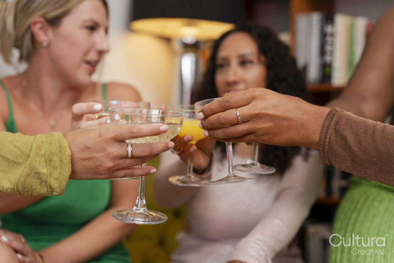 Group of women celebrating at home