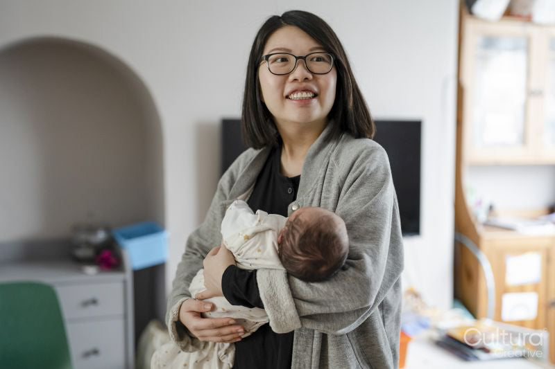 Mother holding newborn baby