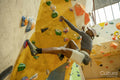 Woman on climbing wall