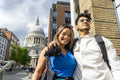 United Kingdom, London, Tourist couple with St Paul''s Cathedral in background