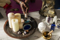 Close-up of woman holding sage incense in yoga studio
