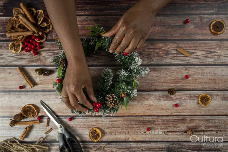 Florist preparing Christmas wreath