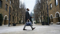 Business man crossing street