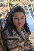 Portrait of young woman with curly hair