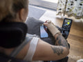 Woman in electric wheelchair using phone