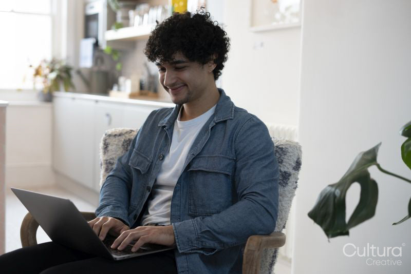 Man working on laptop in office