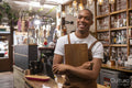 Portrait of smiling cafe owner