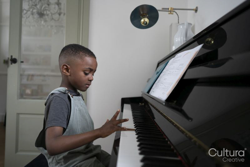 Boy playing piano