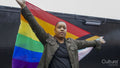 Woman holding pride flag