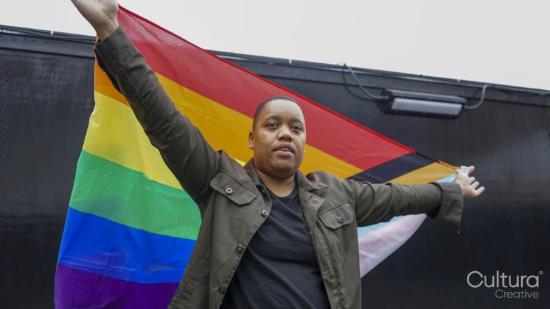Woman holding pride flag