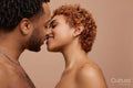Studio portrait of happy young couple