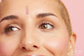 Close up of young woman with decoration on forehead