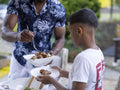 Father and son having barbecue