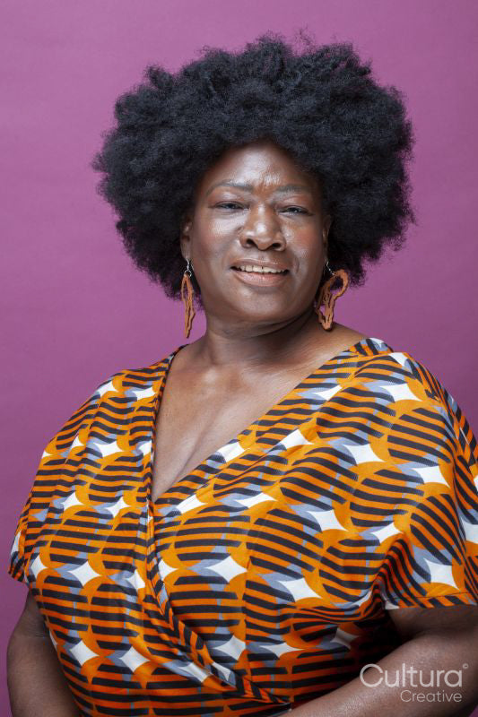 Studio portrait of mature woman with big hair