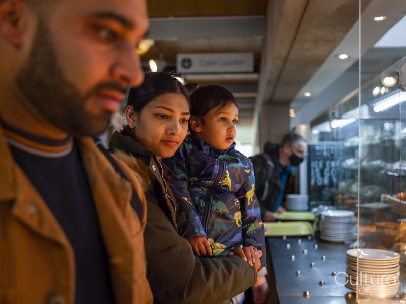 Parents with son in self-service restaurant
