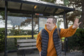Man waiting at bus stop
