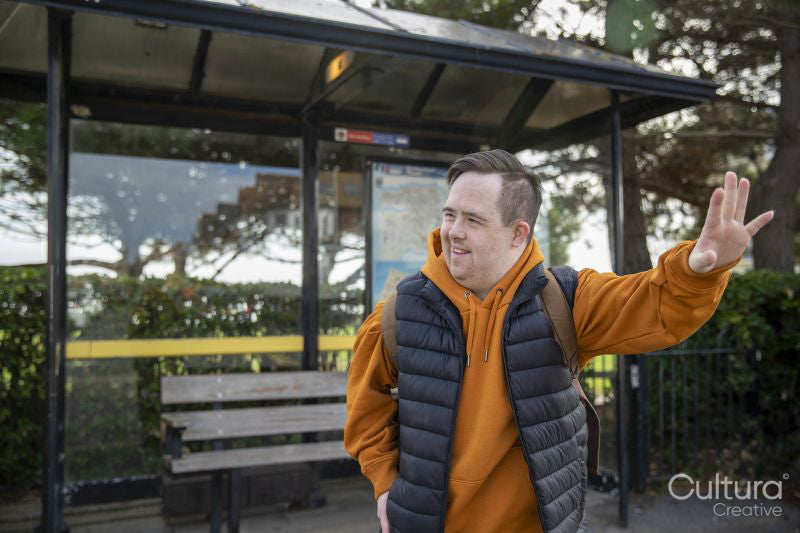 Man waiting at bus stop