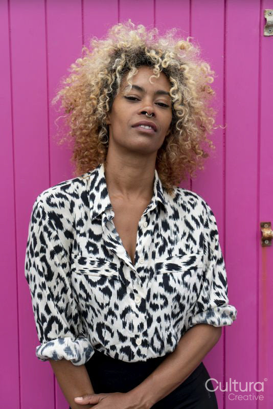 Portrait of woman with curly hair