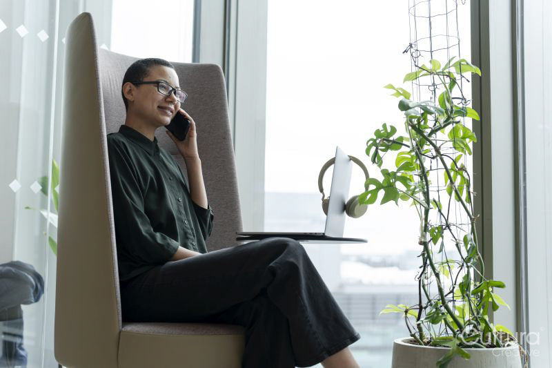 Woman resting in office lobby