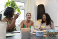 Happy women celebrating at home