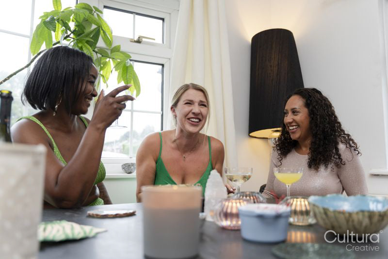 Happy women celebrating at home