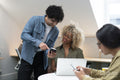 Creative professionals working in office