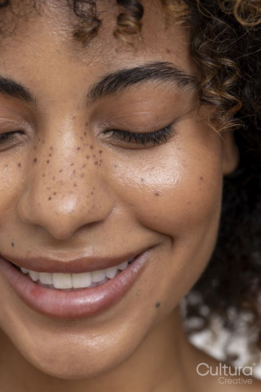 Smiling woman with freckles
