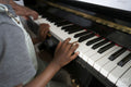 Boy playing piano