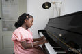 Girl playing piano