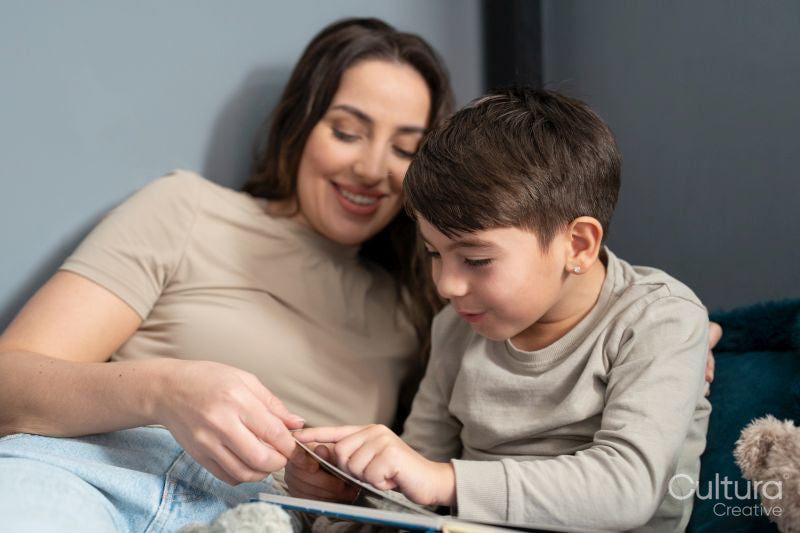 Mother and son reading in bedroom