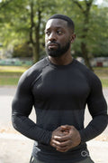 Portrait of athletic man standing in park