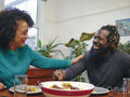 Couple eating lunch at home