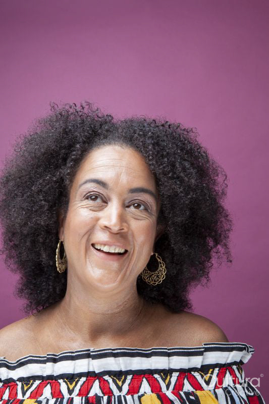 Studio shot of smiling mature woman