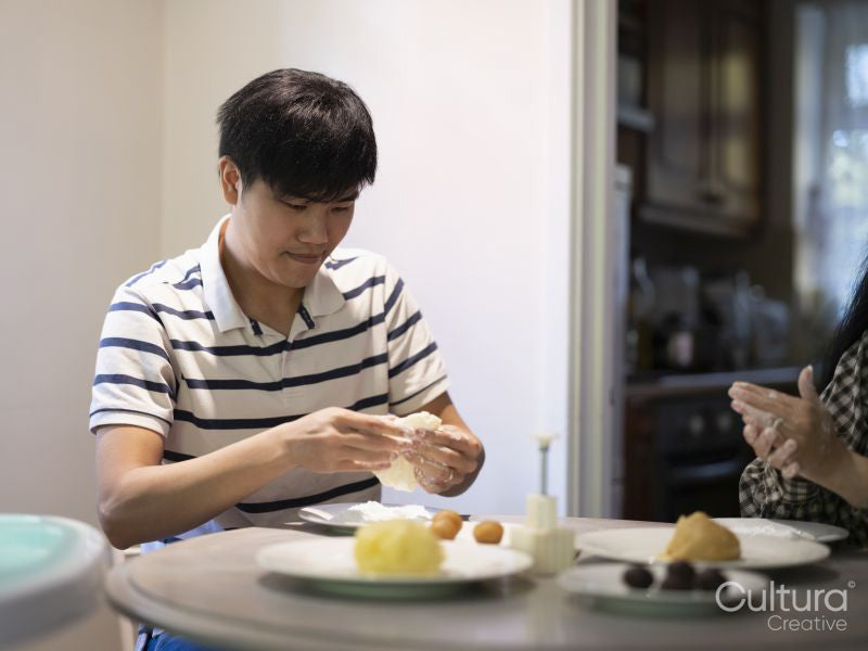 Man and woman baking at home